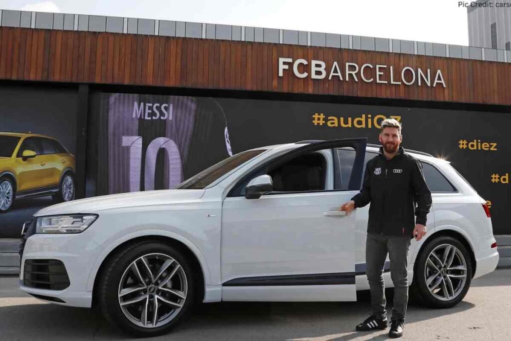 Messi insieme alla sua Audi Q7